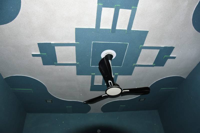 Ceiling texture paint design for a living room